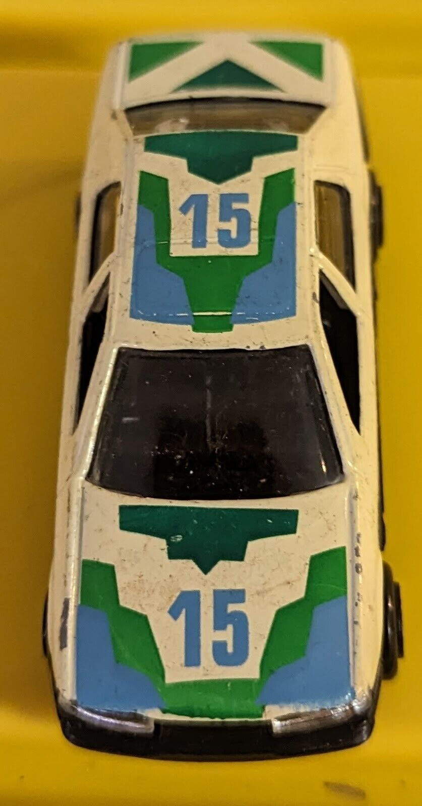 Vintage Yat Ming No. 815 Ford Sierra Beige Blue Green Graphics 1:64 Scale