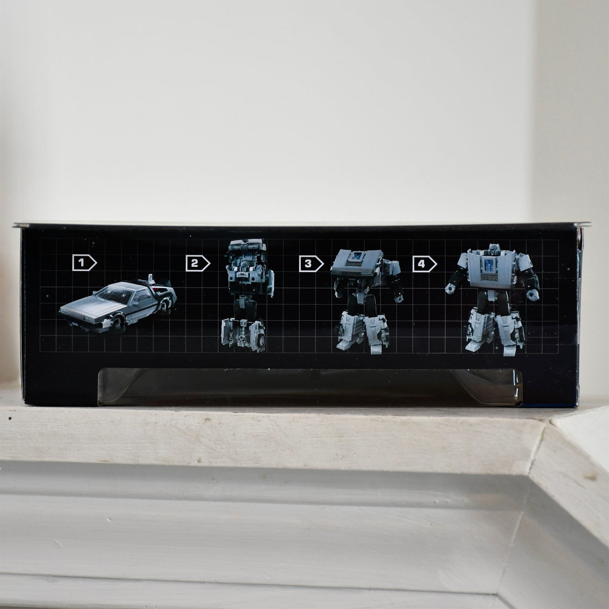 Hasbro Transformers Back to the Future 40th Anniversary Gigawatt Delorean Figure